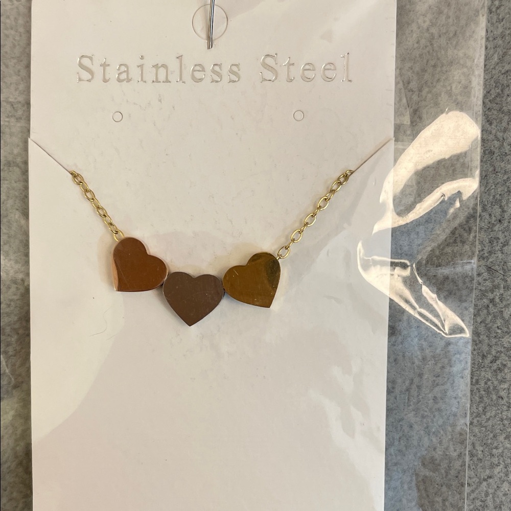 Triple sliding Heart necklace stainless steel, with a gold, silver, and copper